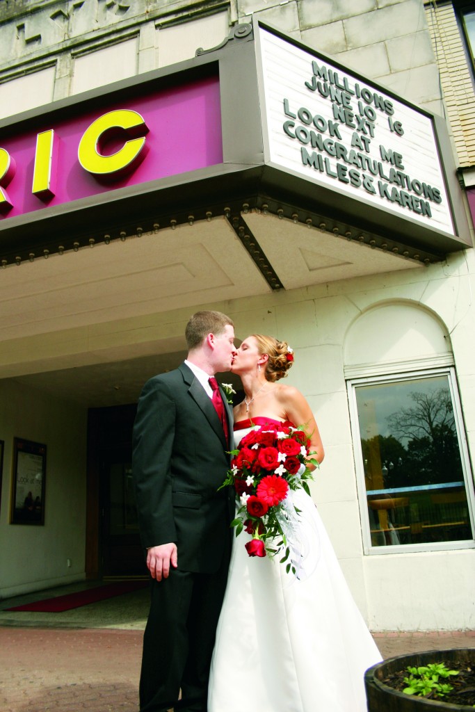 Wedding rentals - Newlywed couple under the Lyric Marquee